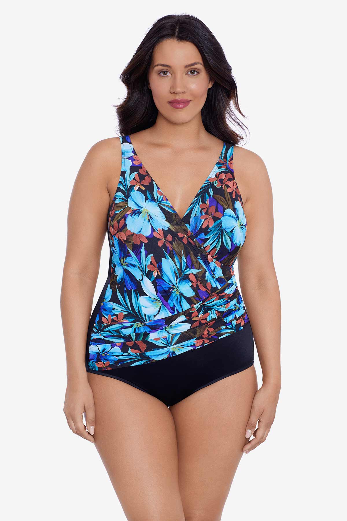 Woman wearing a blue and maroon floral printed one-piece swimsuit