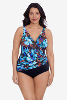 Woman wearing a blue and maroon floral printed one-piece swimsuit