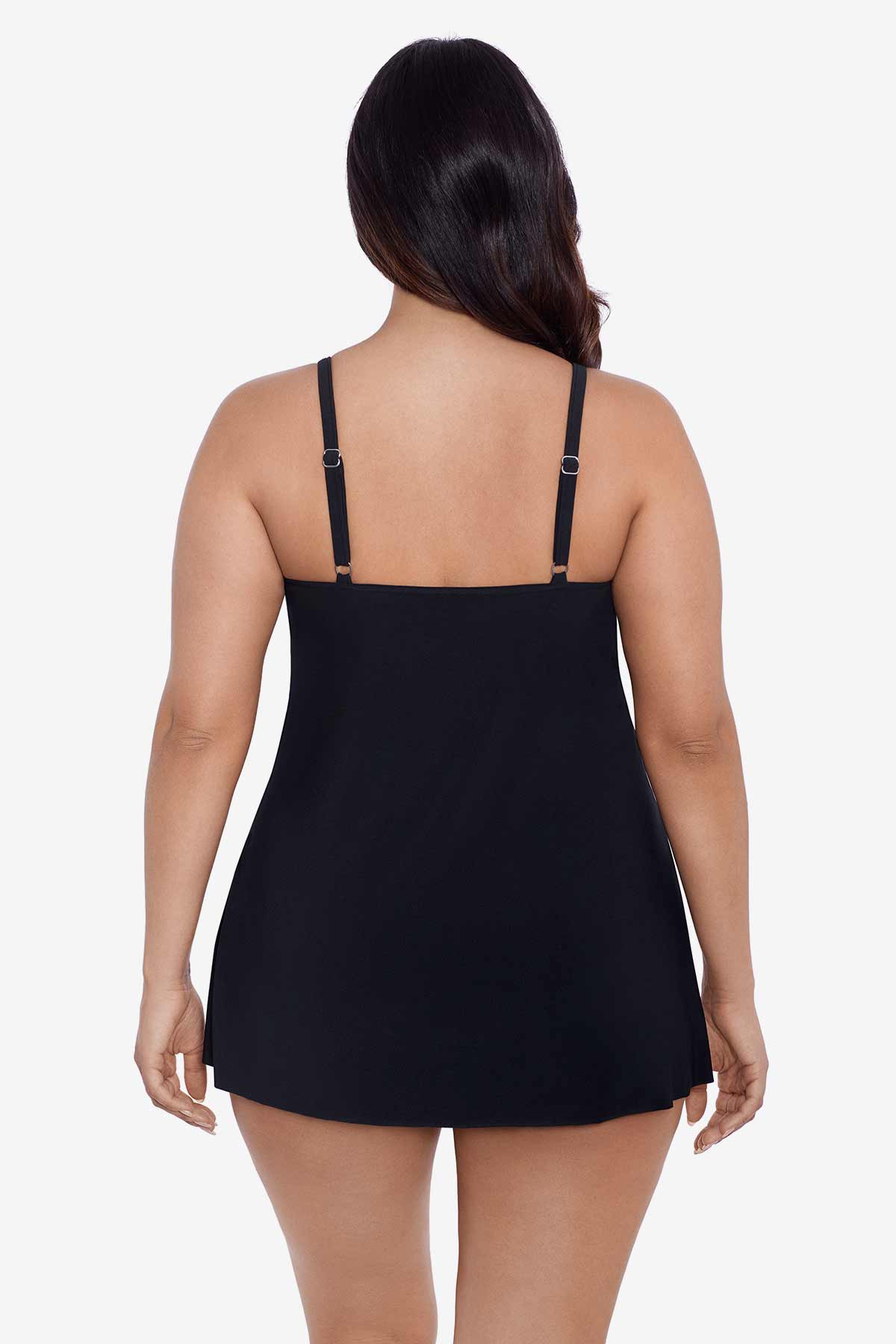 Woman faced away wearing a black ruffle swim dress