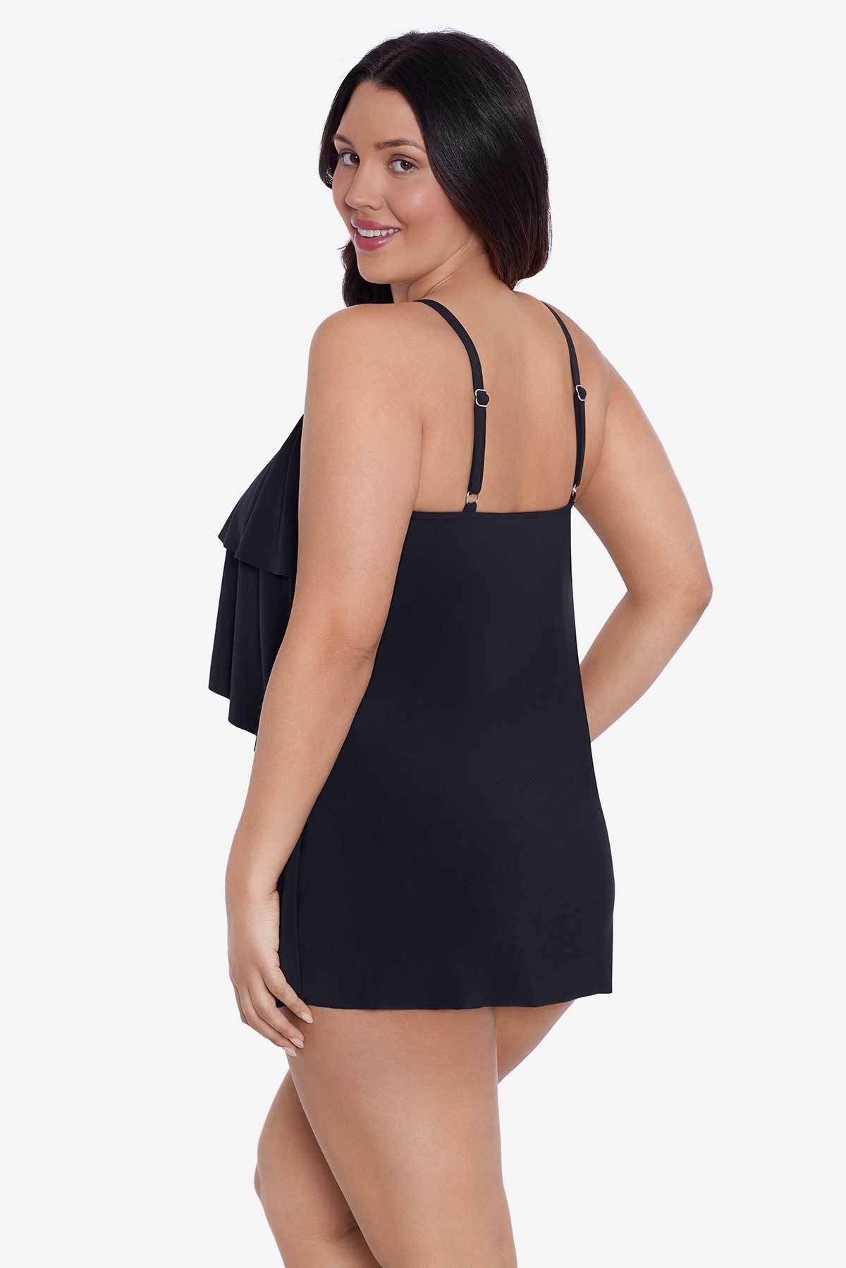 Woman turned left wearing a black ruffle swim dress