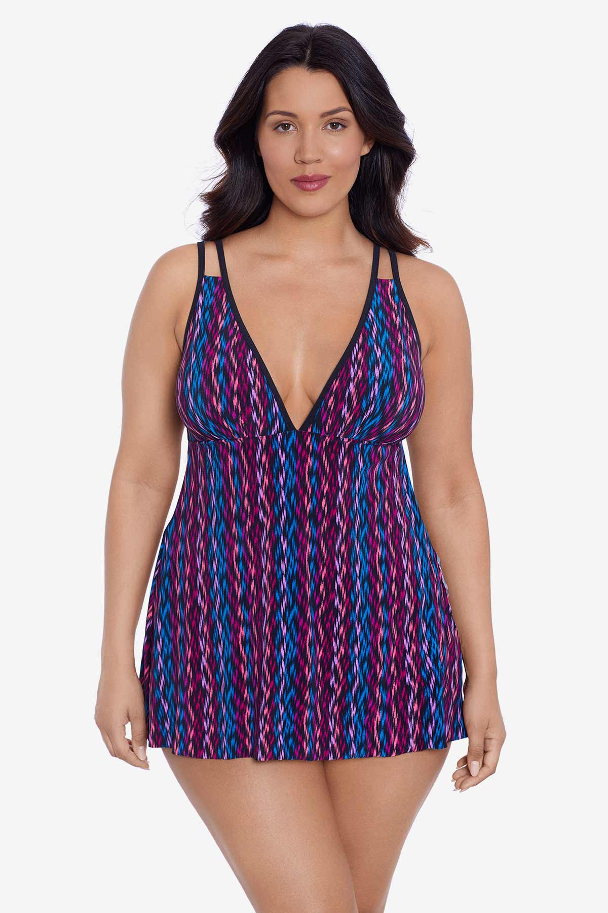 Woman wearing a purple and blue stripey pattern swim dress