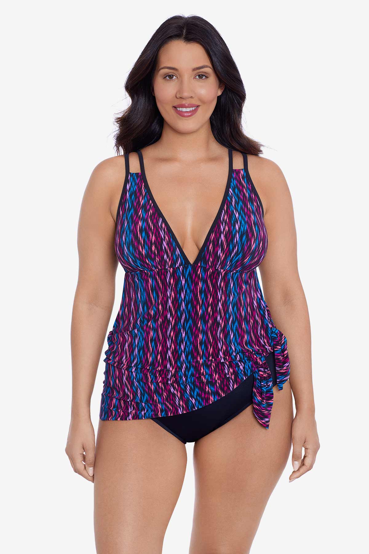 Woman wearing a purple and blue stripey pattern swim dress tied at the side