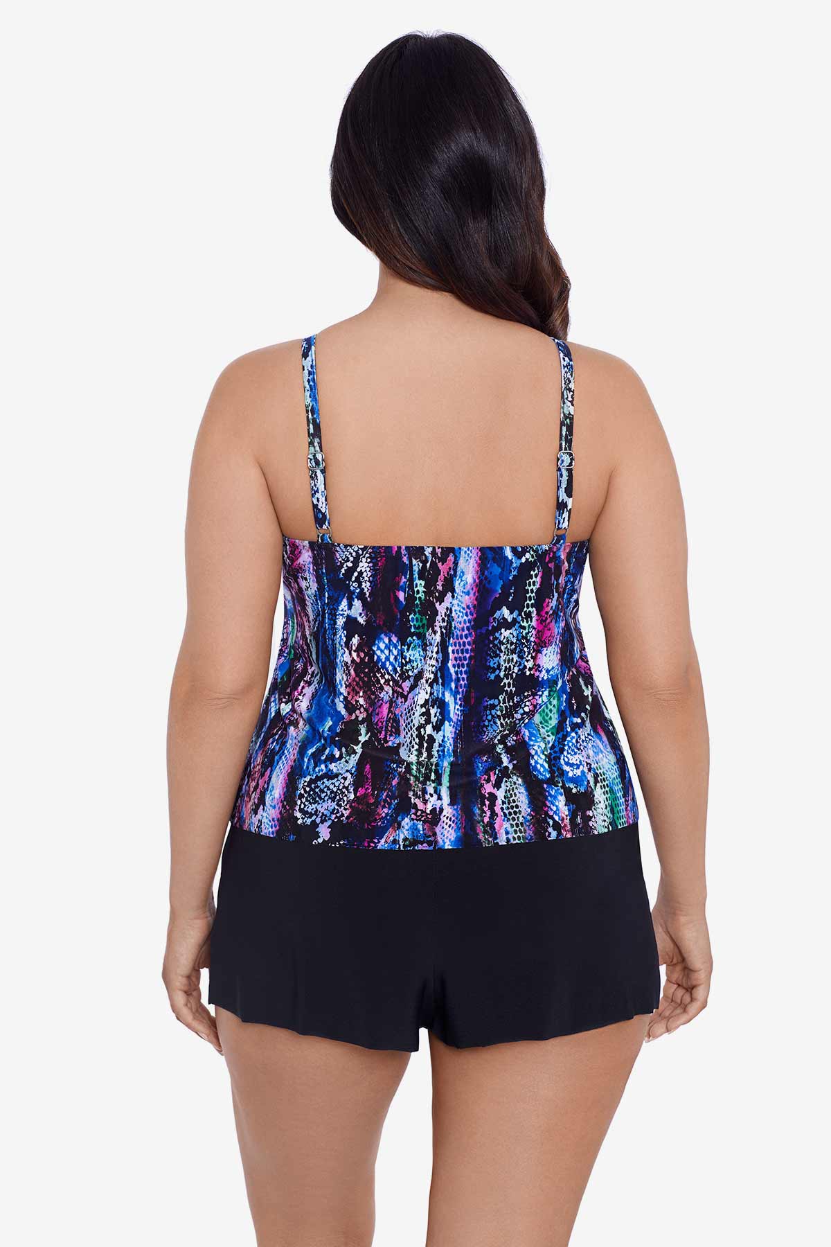 Woman faced away wearing an abstract snakeskin printed swim romper