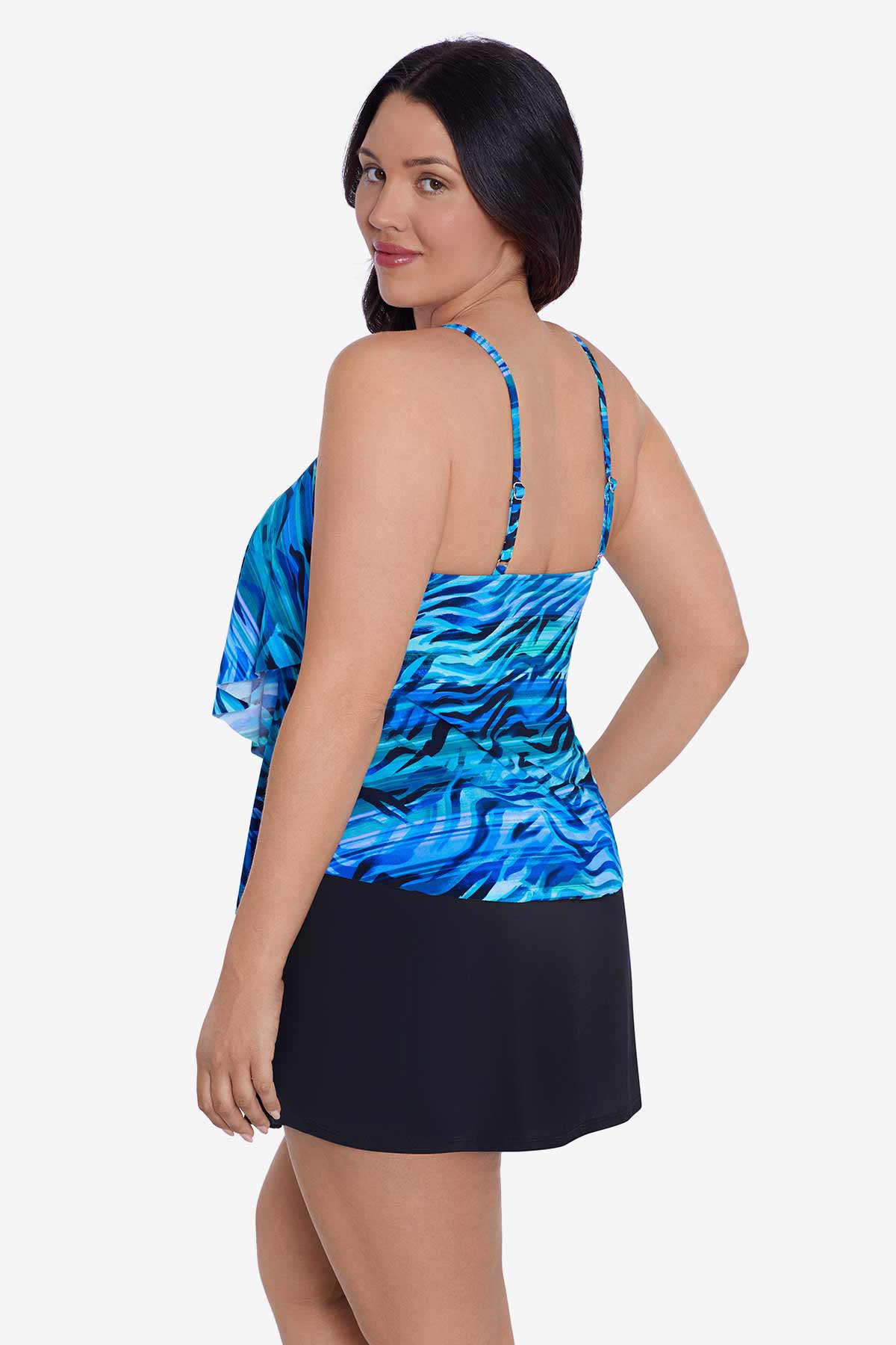 Woman faced left wearing a blue wave printed tankini top