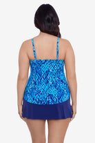 Woman faced away wearing a blue diamond printed tankini top