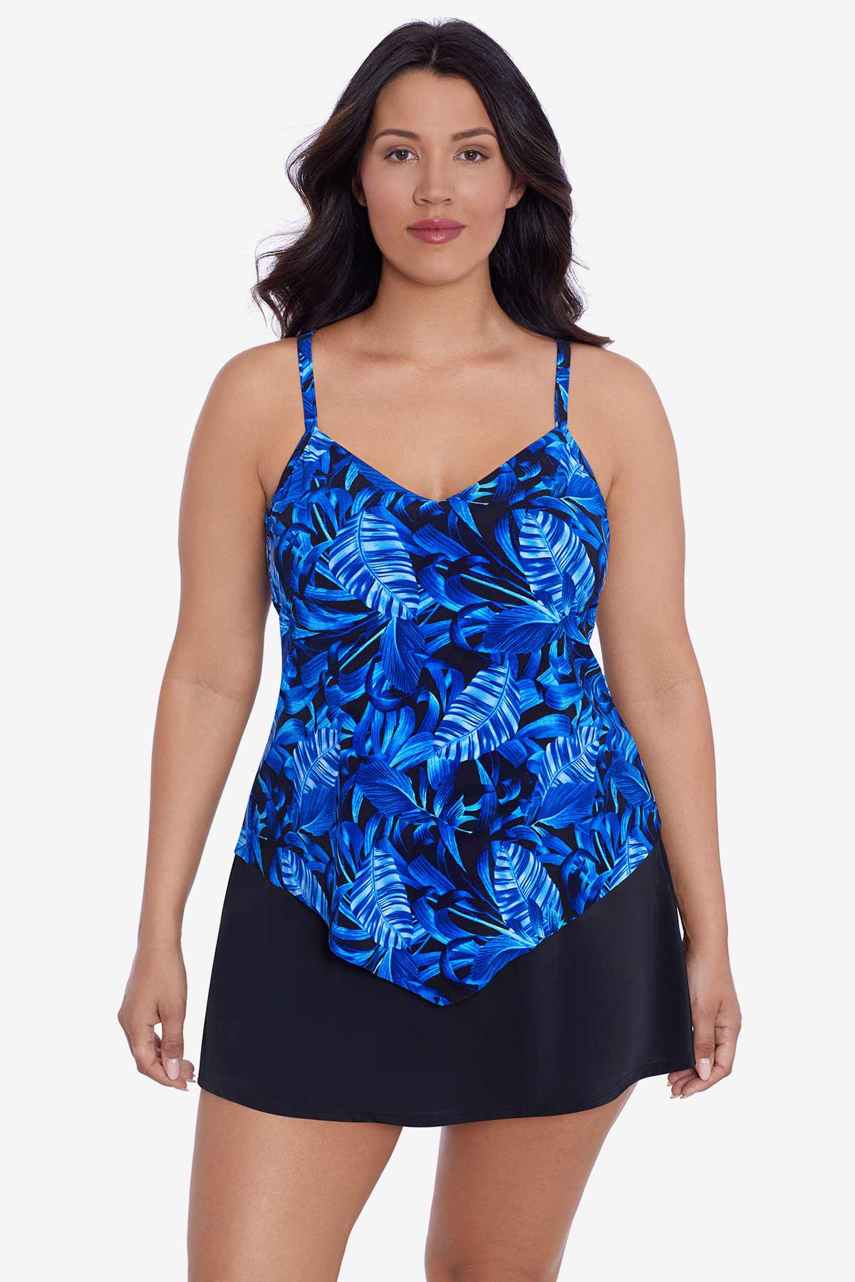 Woman wearing a blue palm leaf printed tankini top