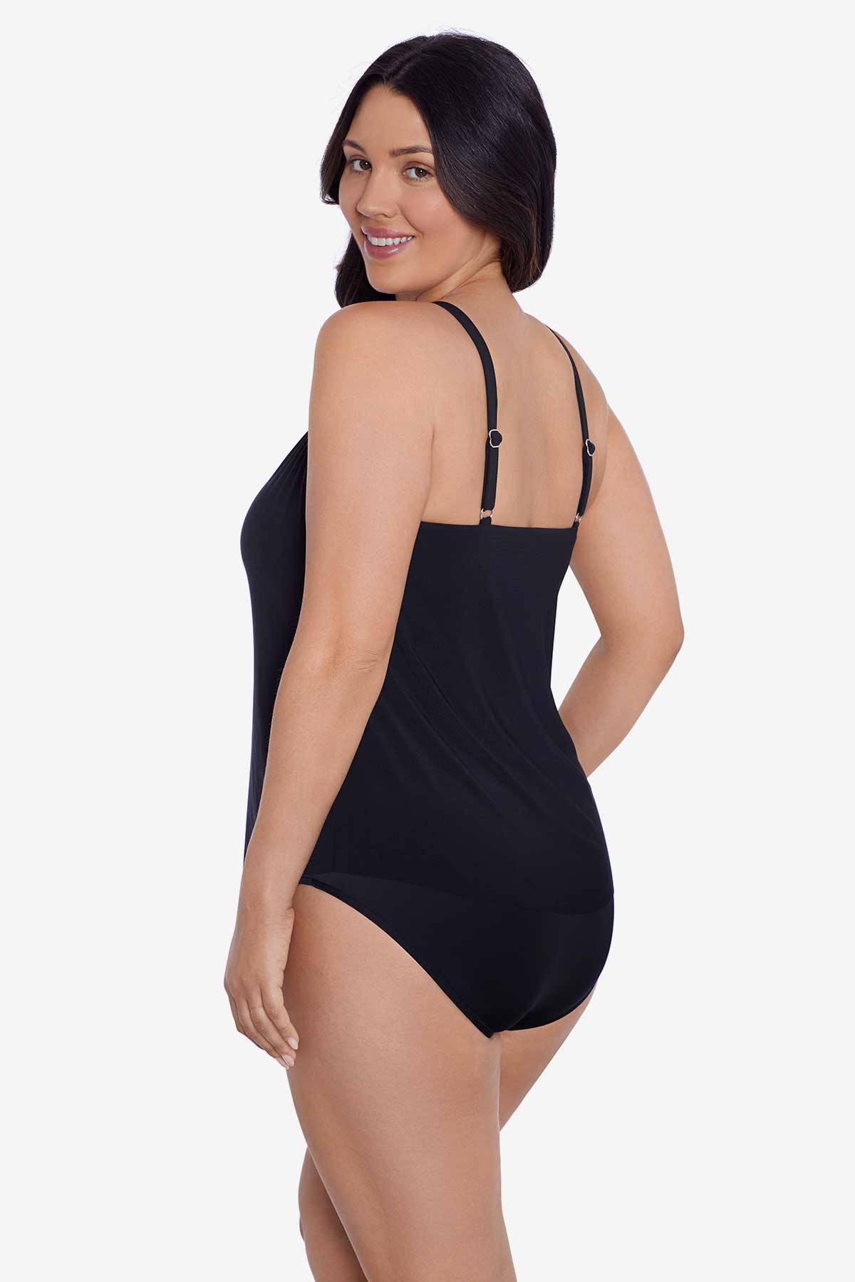 Woman turned left wearing a black tankini top 