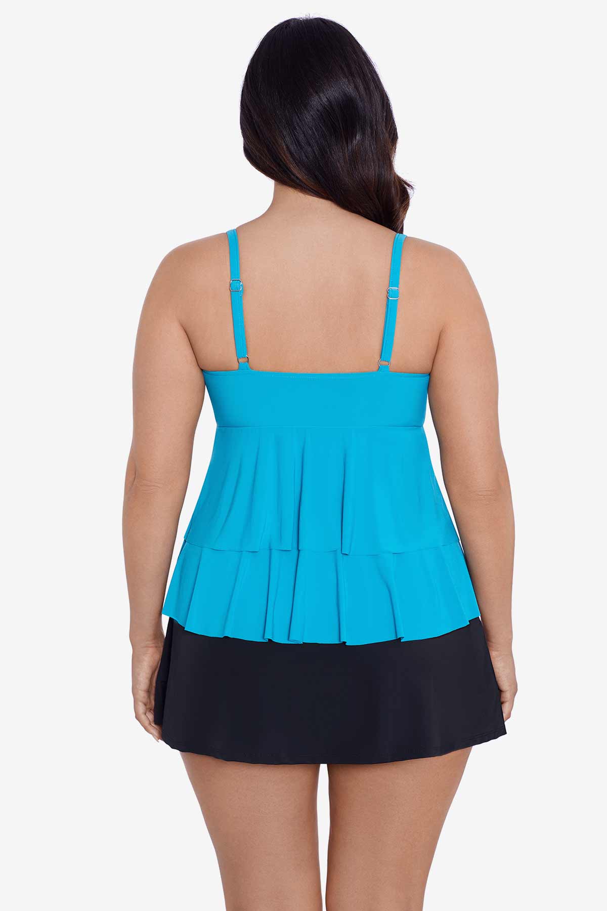 Woman faced away wearing a light blue tiered tankini top