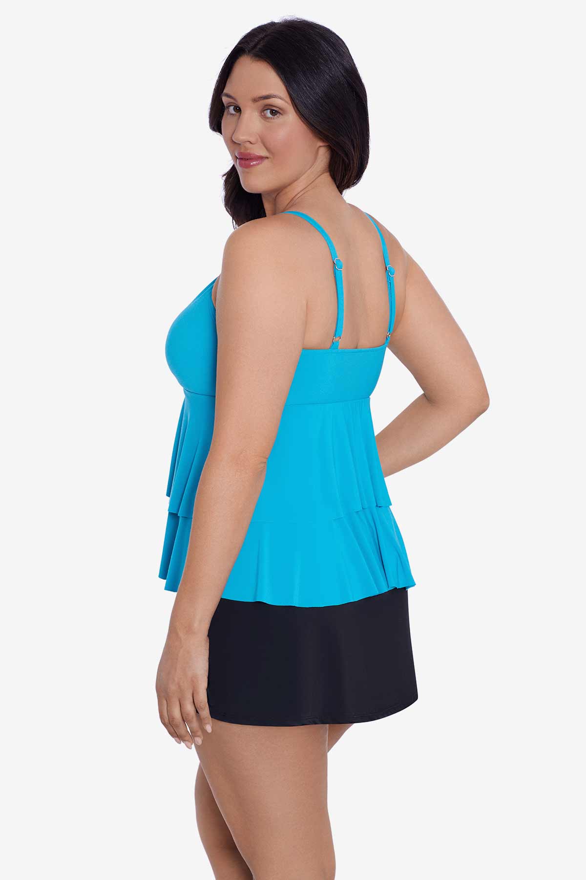 Woman turned left wearing a light blue tiered tankini top