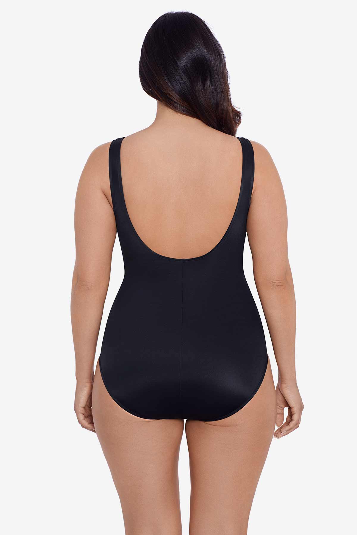 Woman faced away wearing a black one-piece swimsuit