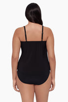 Woman faced away wearing a tankini top 