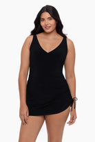 Woman wearing a black swim dress
