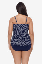Woman faced away wearing an animal-esque printed tankini top