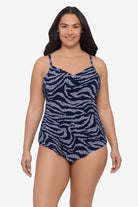 Woman wearing an animal-esque printed tankini top