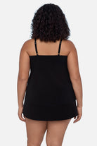 Woman turned away wearing a tankini top 