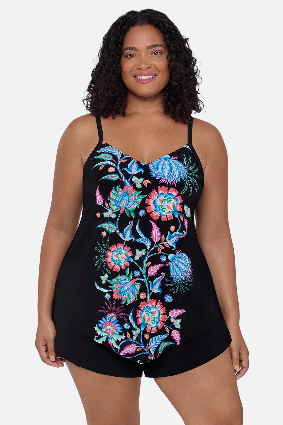 Woman wearing a blue and pink floral print tankini top