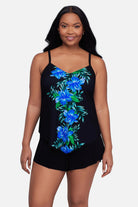Woman wearing a blue floral printed tankini top 