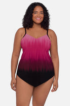 Woman wearing a pink ombre tankini top