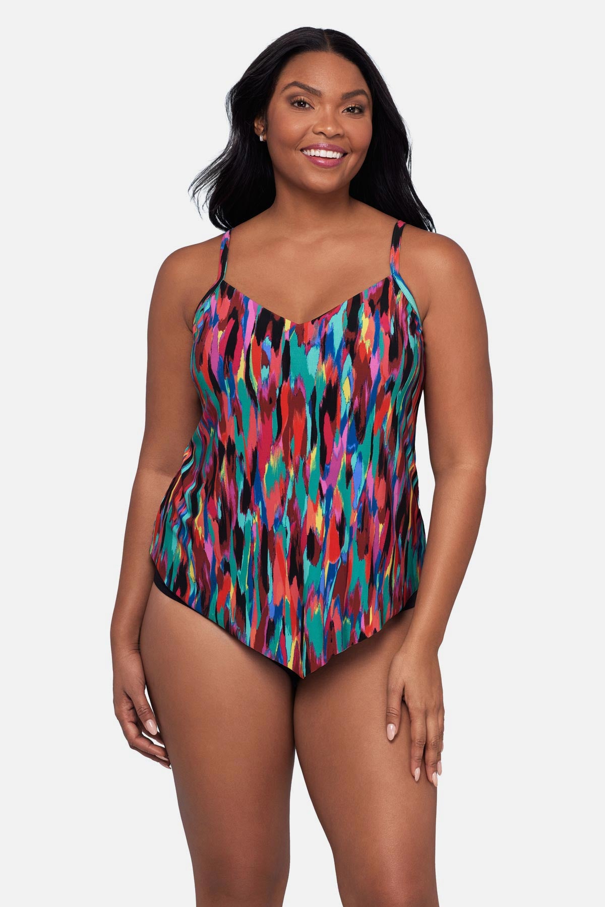 Woman wearing an abstract multicolored printed tankini top