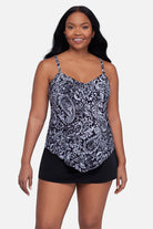 Woman wearing a black and white paisley printed tankini top