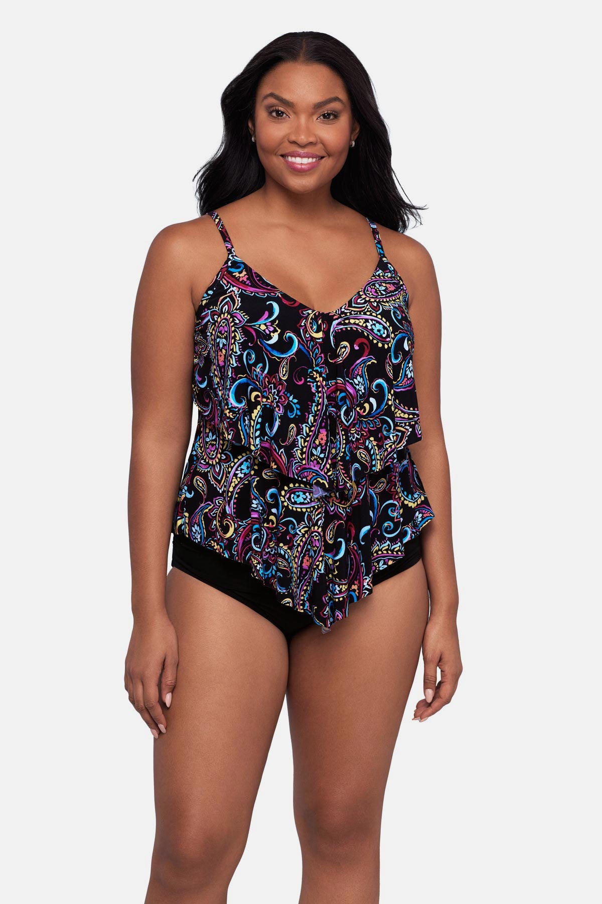 Woman wearing a multicolored paisley printed tankini top with ruffles