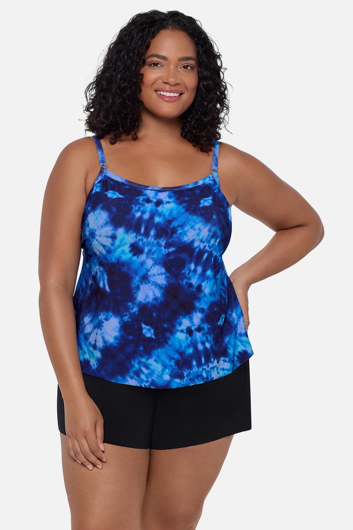 Woman wearing a blue tie dye swim romper
