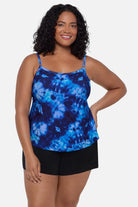 Woman wearing a blue tie dye swim romper