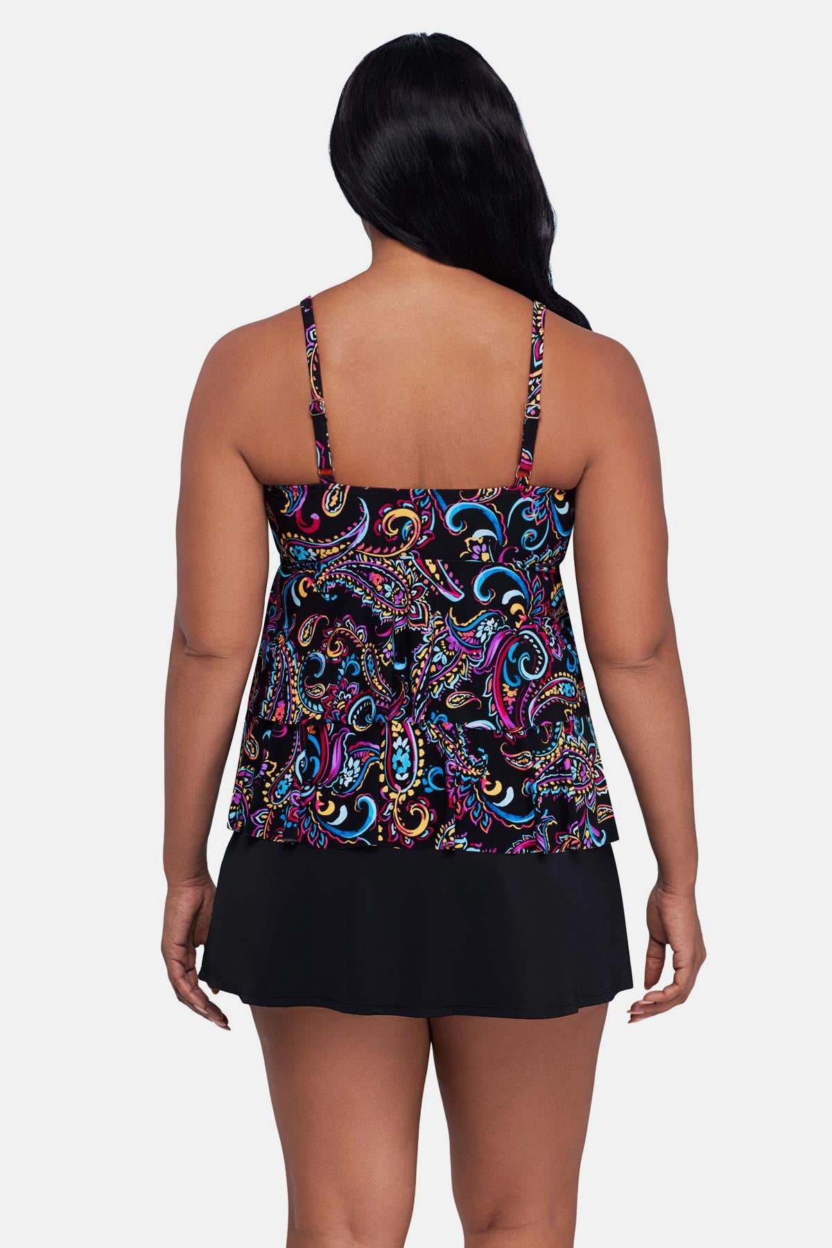 Woman turned away wearing a multicolored paisley printed tankini top