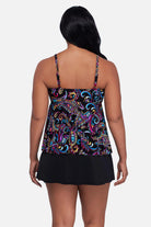 Woman turned away wearing a multicolored paisley printed tankini top