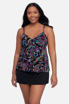 Woman wearing a multicolored paisley printed tankini top