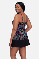 Woman turned left wearing a multicolored paisley printed tankini top