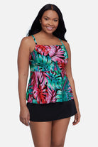 Woman wearing a multicolor palm leaf printed tankini top