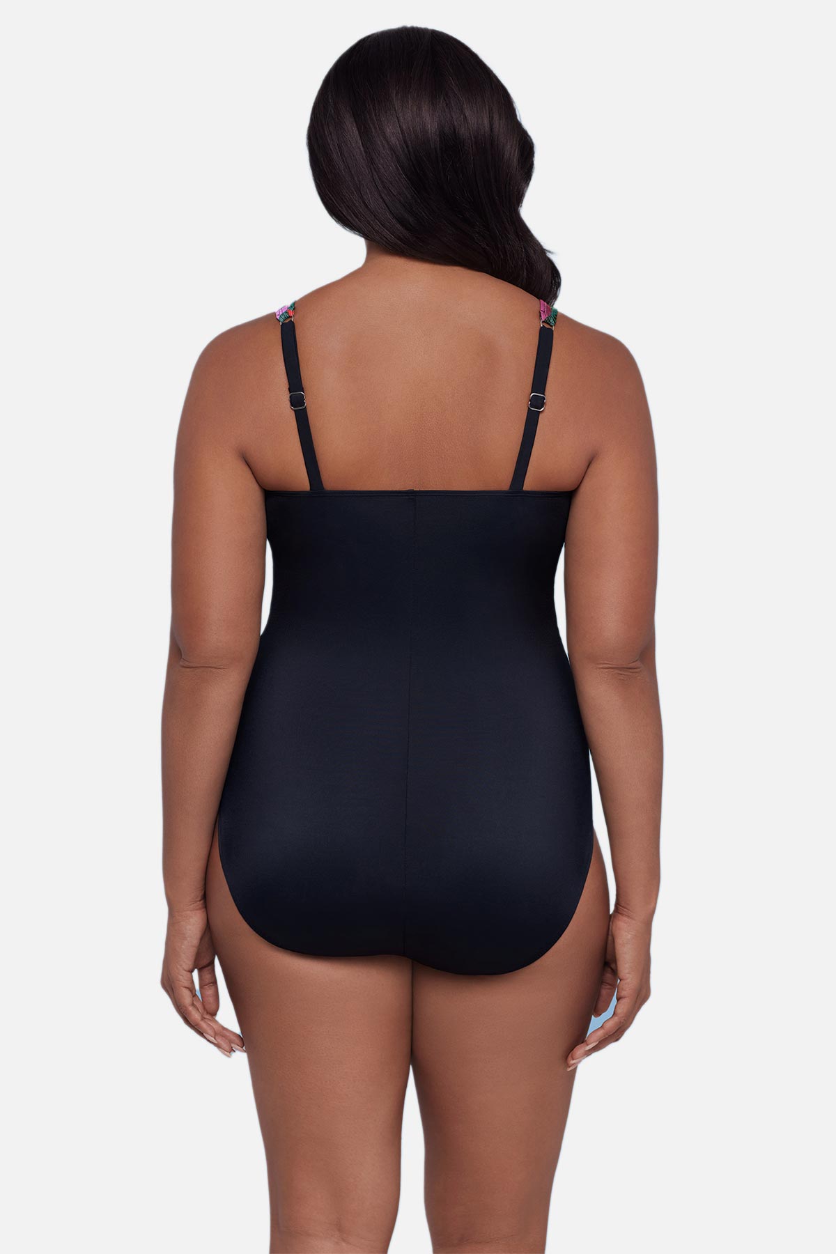 Woman turned away wearing a one-piece swimsuit