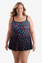 Woman wearing a multicolored floral printed pattern swim dress