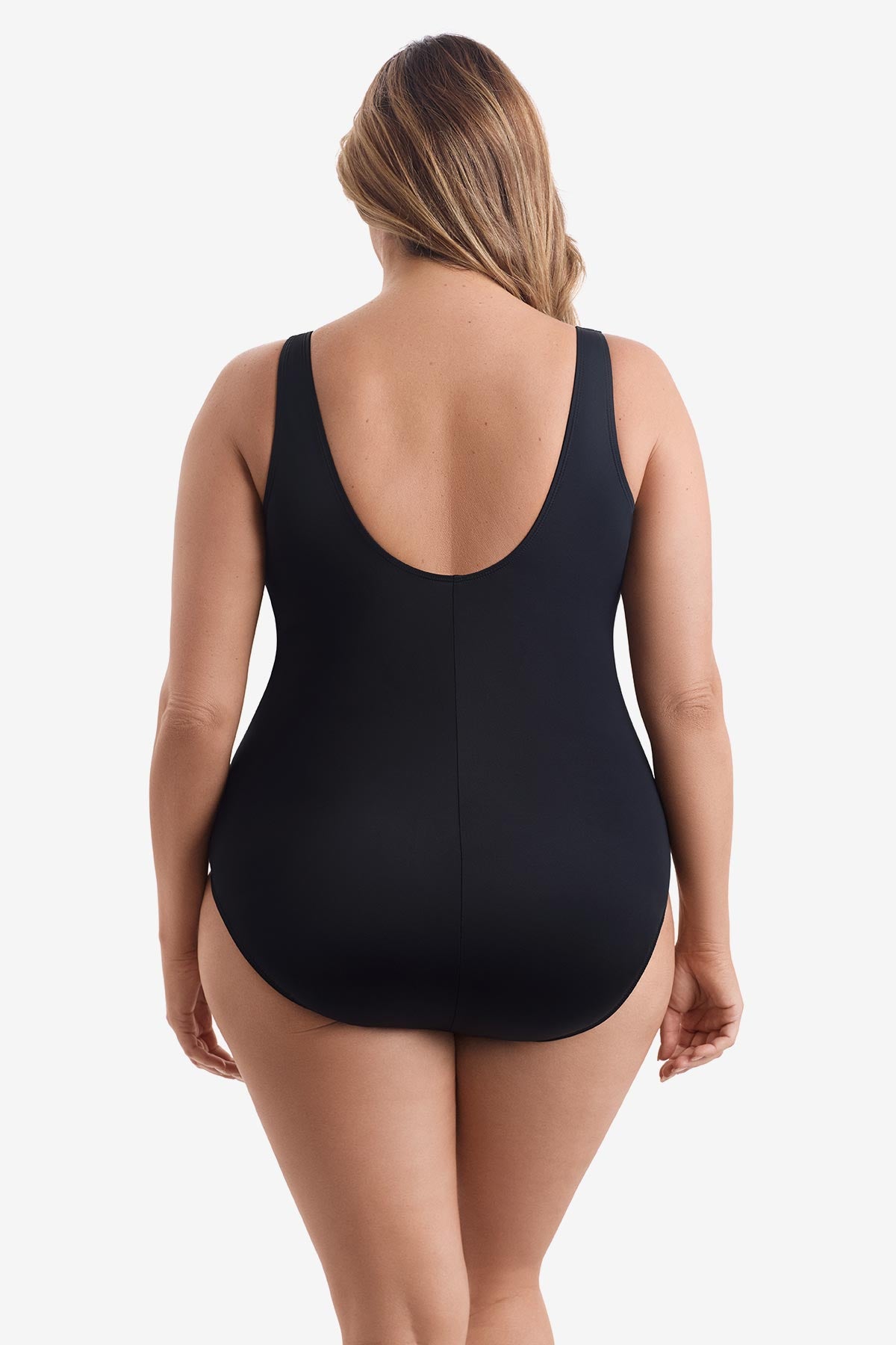 Woman faced away wearing a black one-piece swimsuit