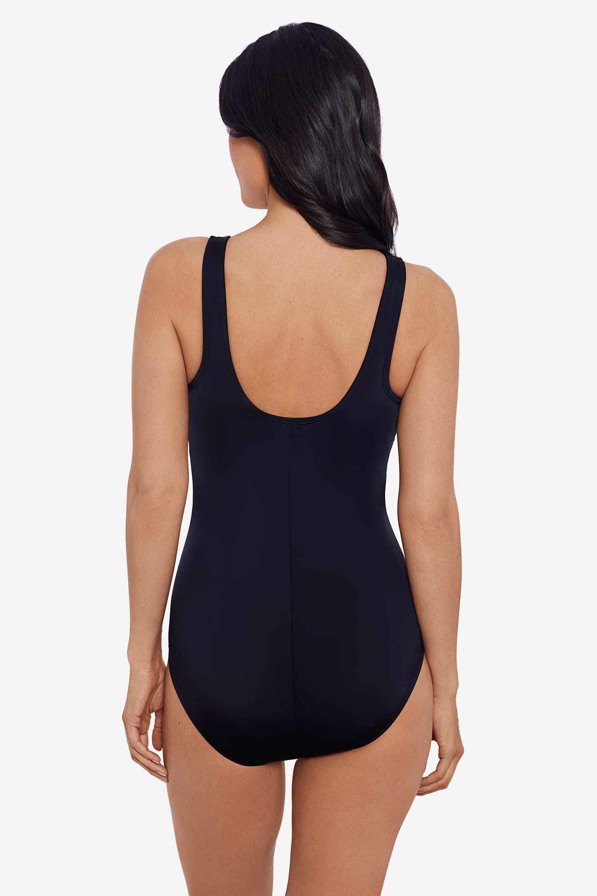 Woman turned away wearing a one-piece swimsuit