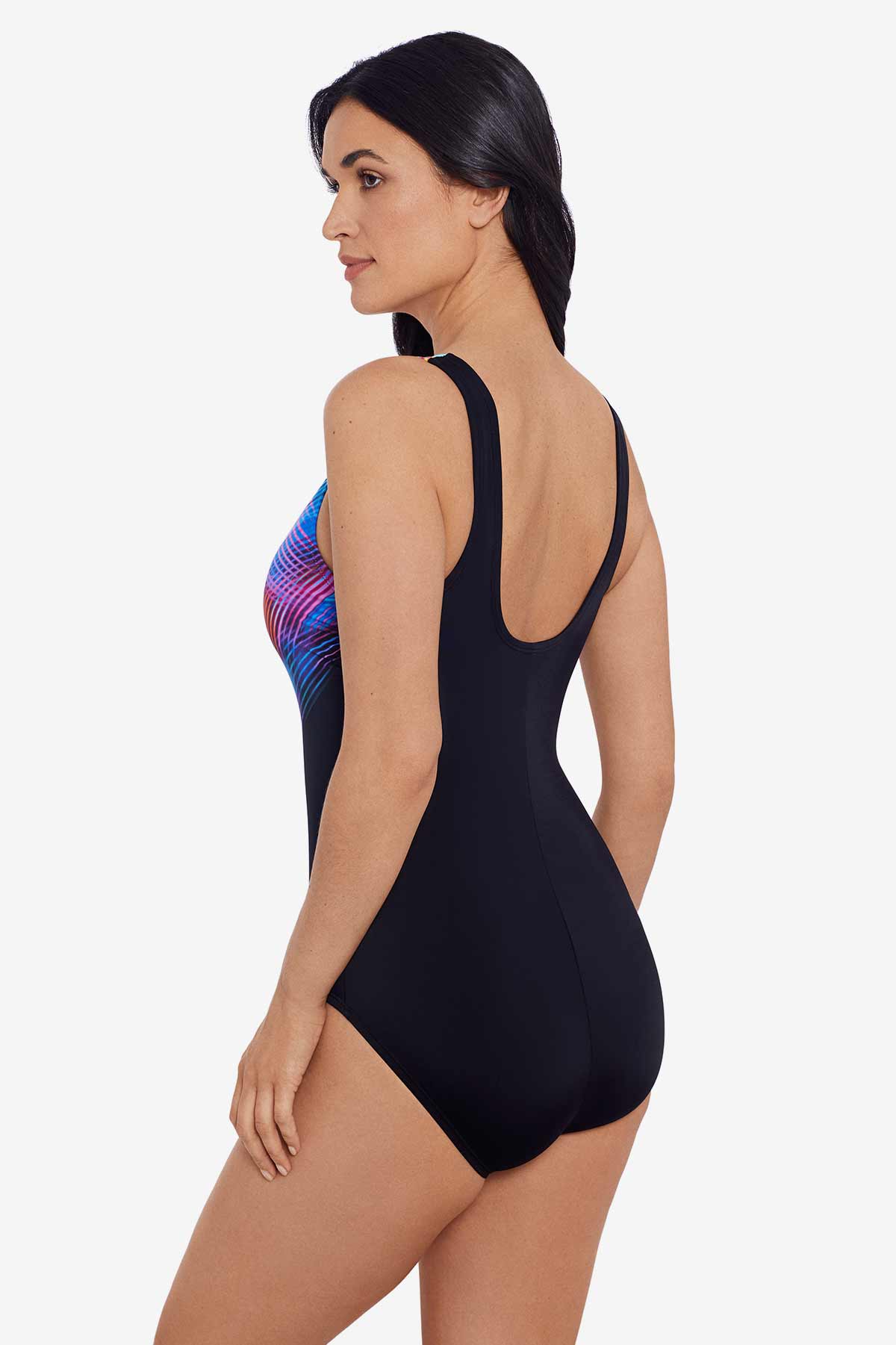 Woman turned left wearing a rainbow crosshatch pattern one-piece swimsuit