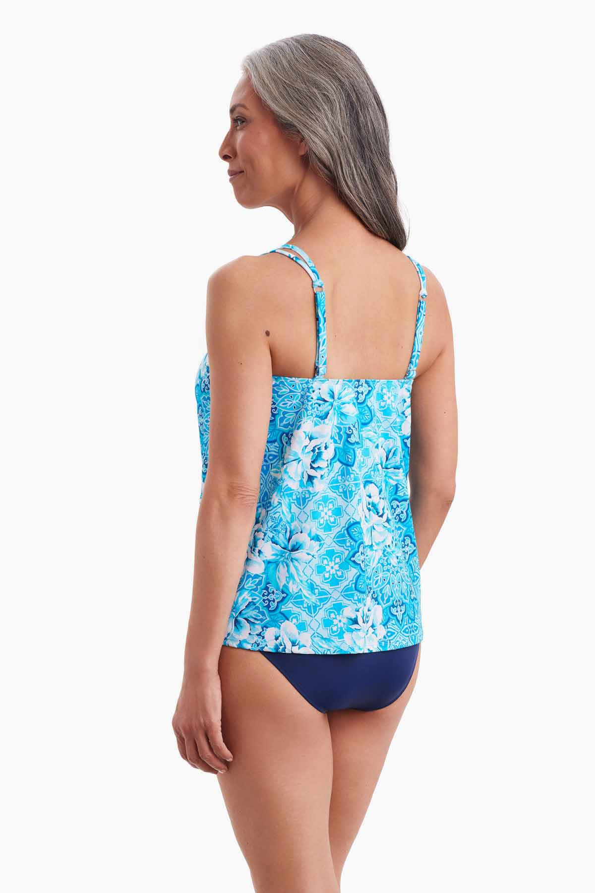Woman turned left to sow detail of tankini top