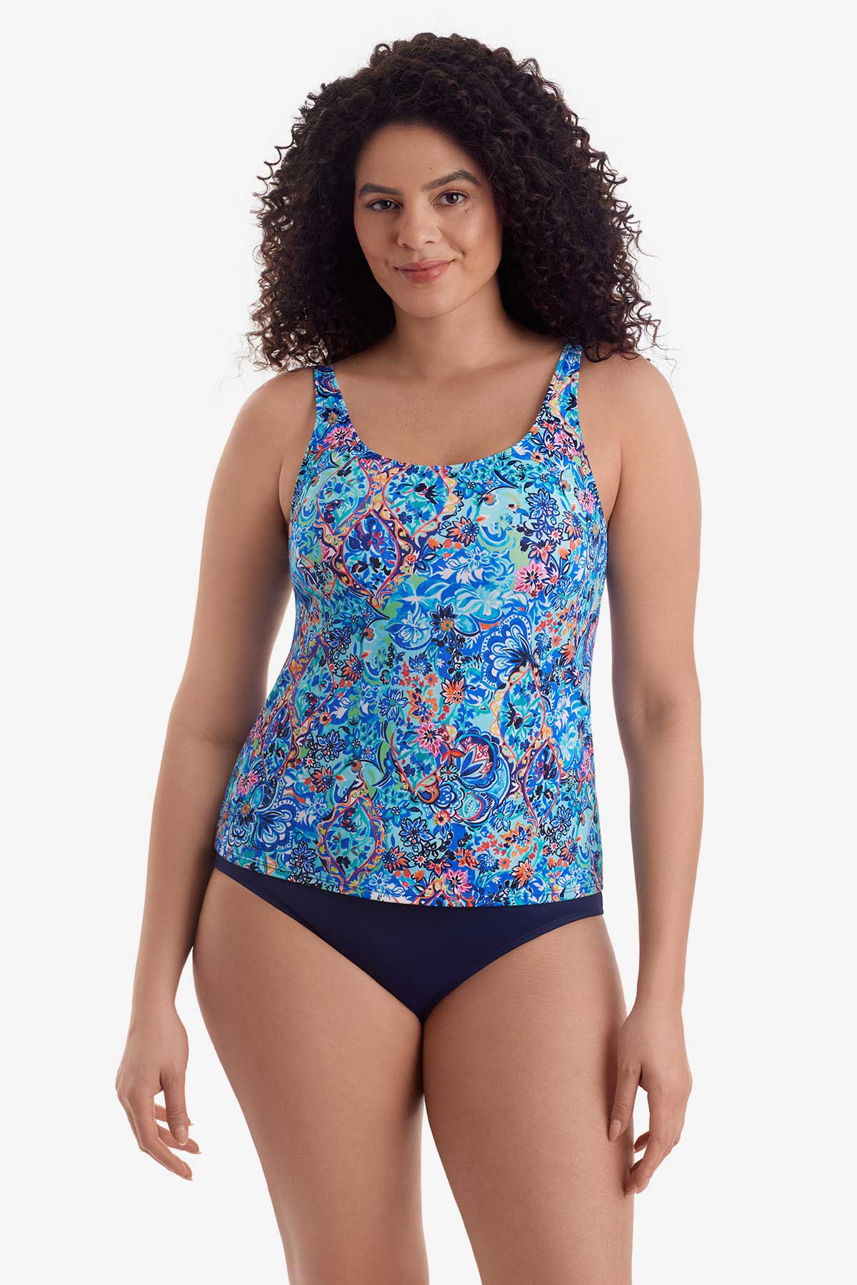 Woman wearing a blue paisley-esque printed tankini top
