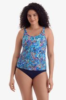 Woman wearing a blue paisley-esque printed tankini top