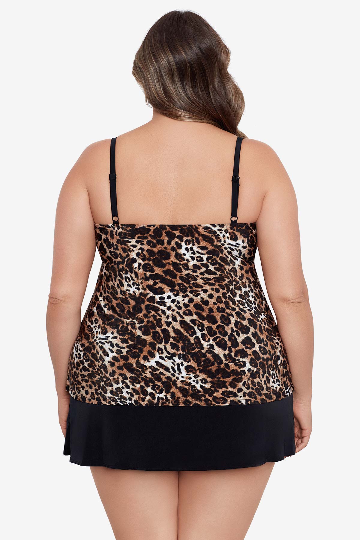 Woman turned away wearing a cheetah print ruffled one-piece faux skirtini swimsuit