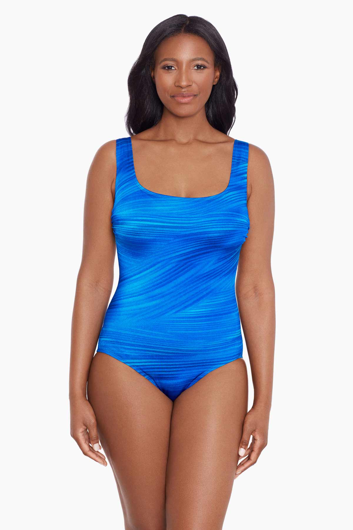 Woman wearing a blue streaked pattern one-piece swimsuit