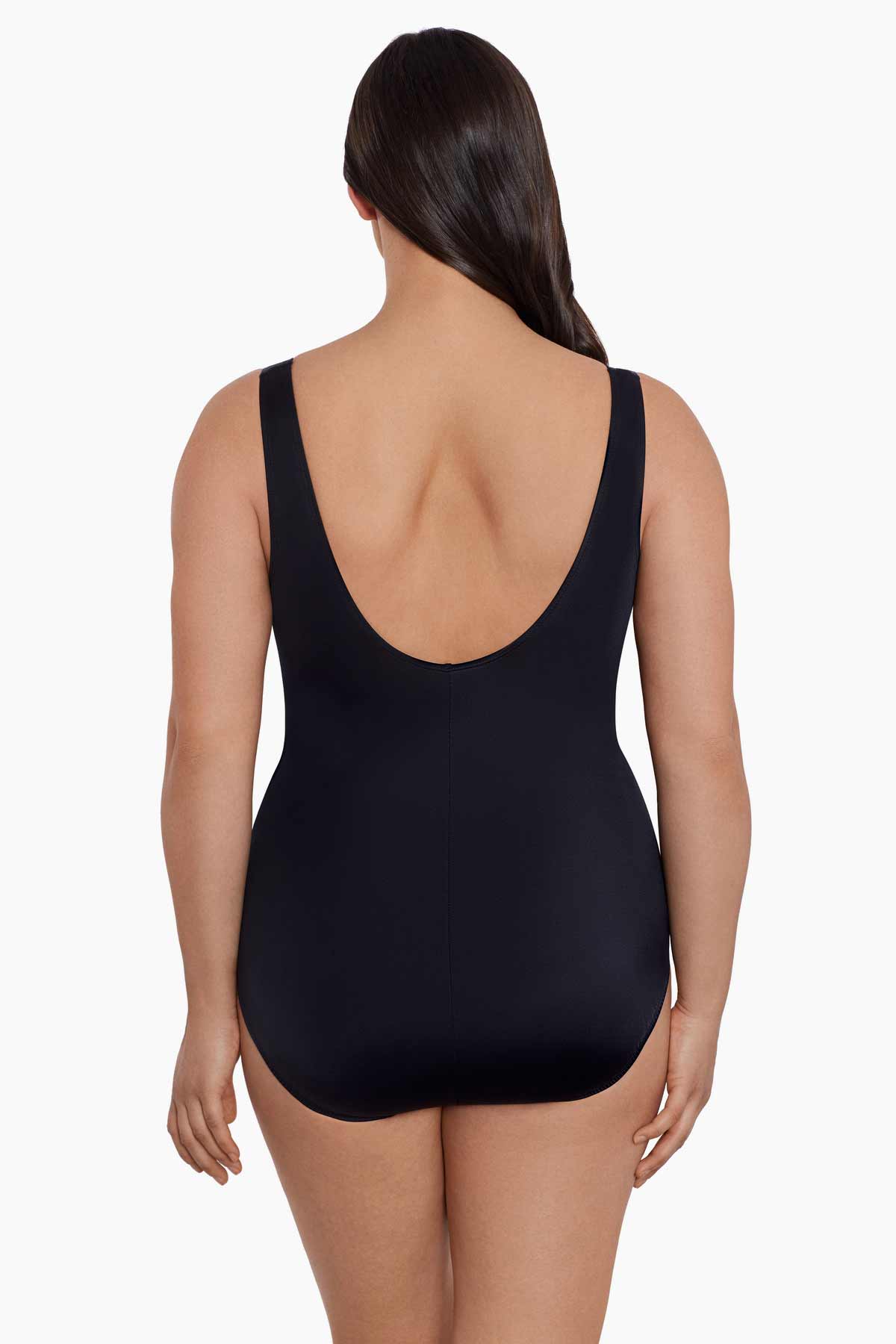 Woman faced away wearing a black swimsuit 