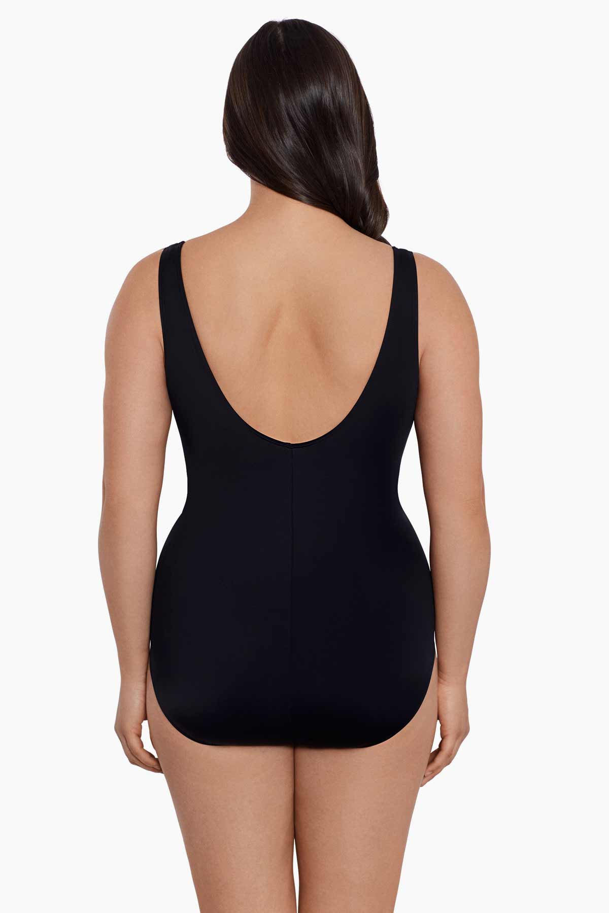 Woman wearing a black one-piece swimsuit