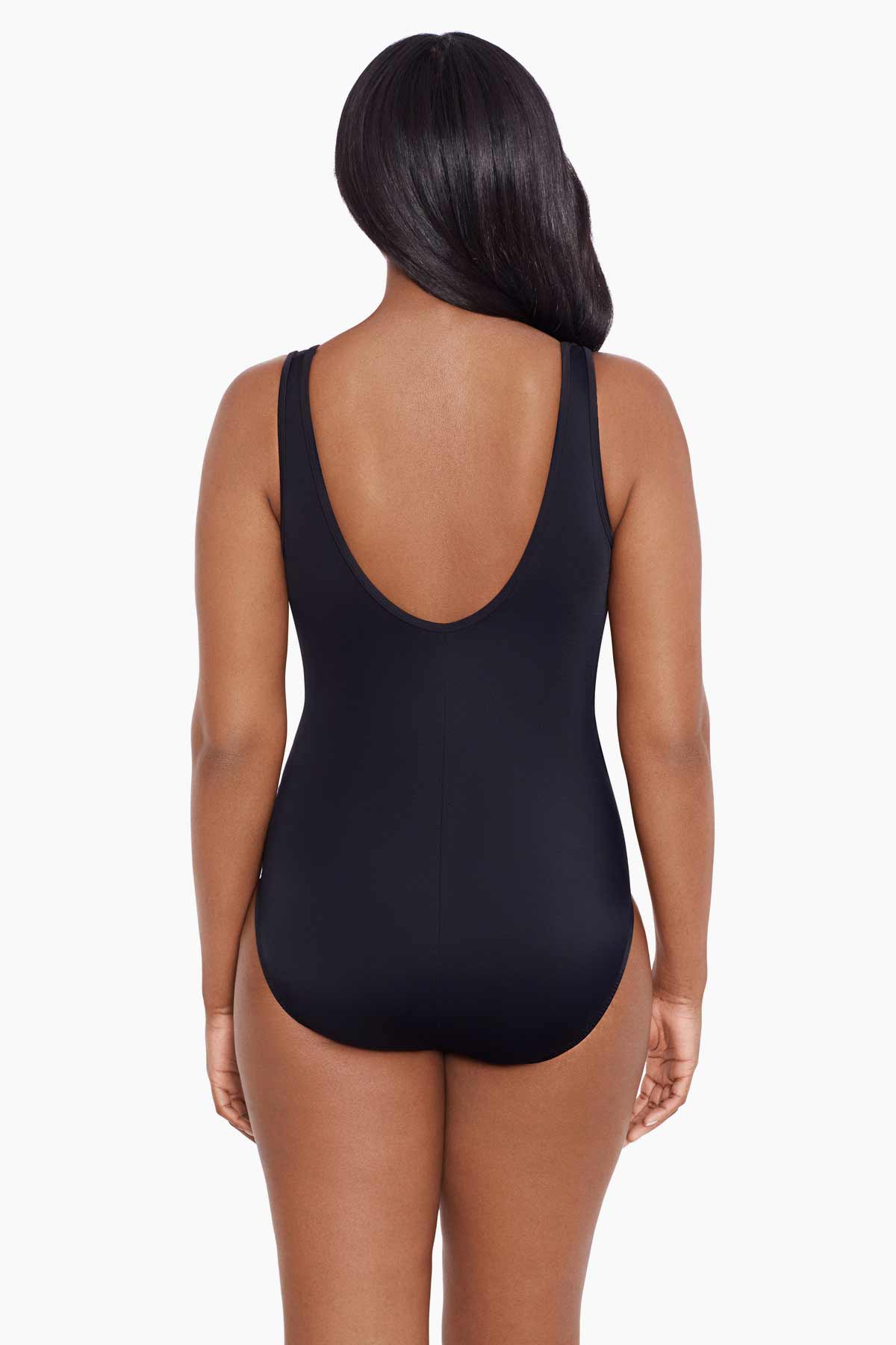 Woman faced away wearing a black mesh high neck one-piece swimsuit