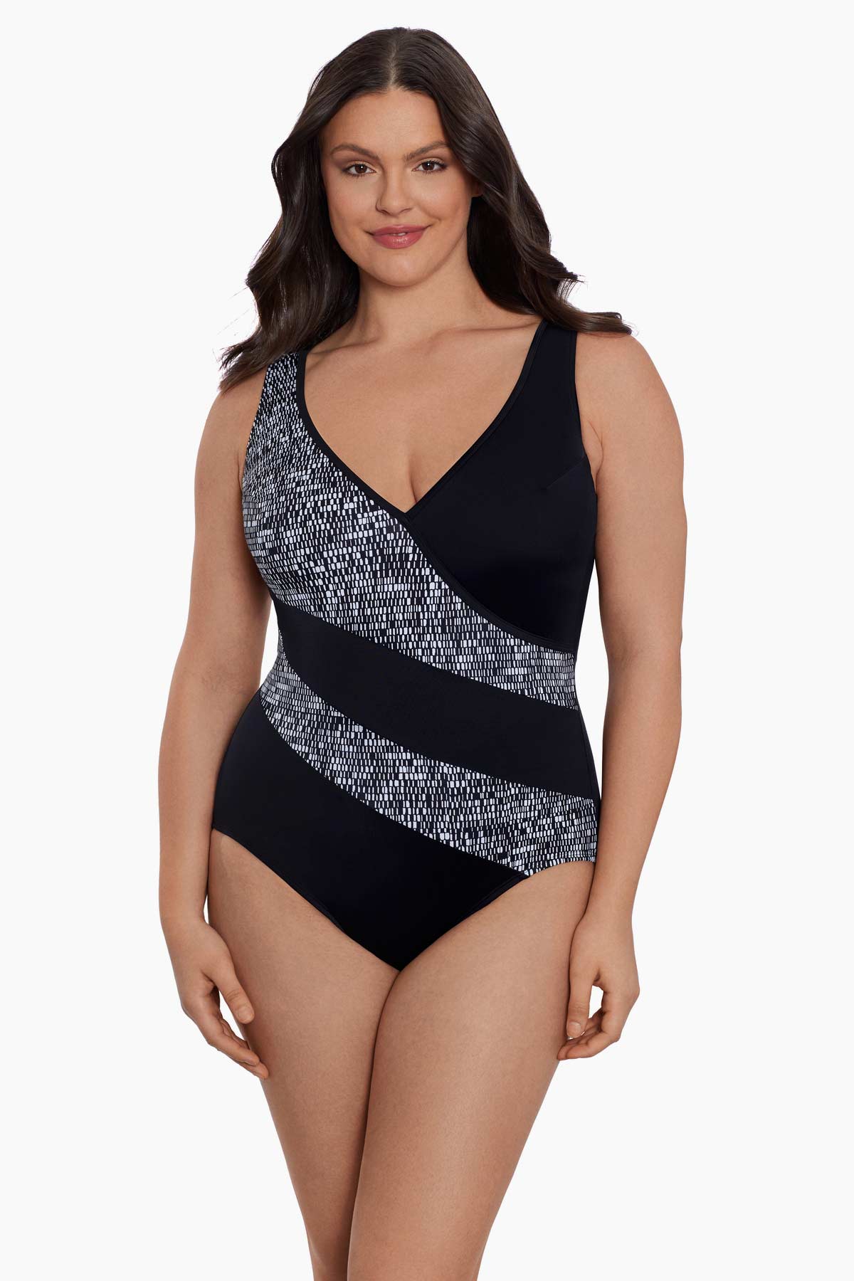 Woman wearing a static print inside two stripes down the front one-piece swimsuit