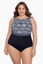 Woman wearing a black and white garland printed one-piece high neck swimsuit