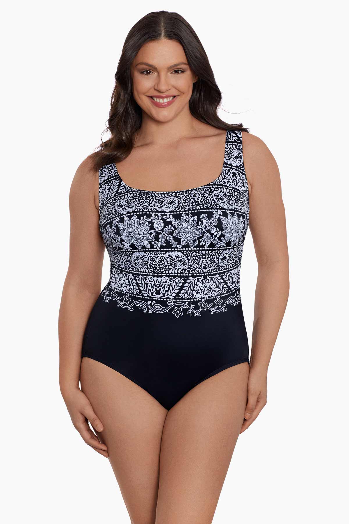 Woman wearing a black and white garland printed one-piece swimsuit