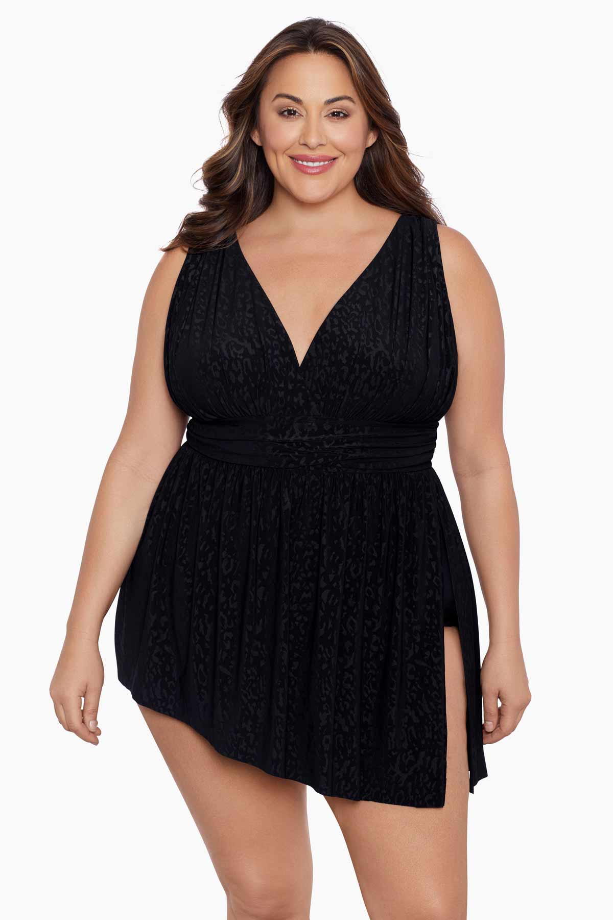 Woman wearing a black light animal-esque printed swim dress