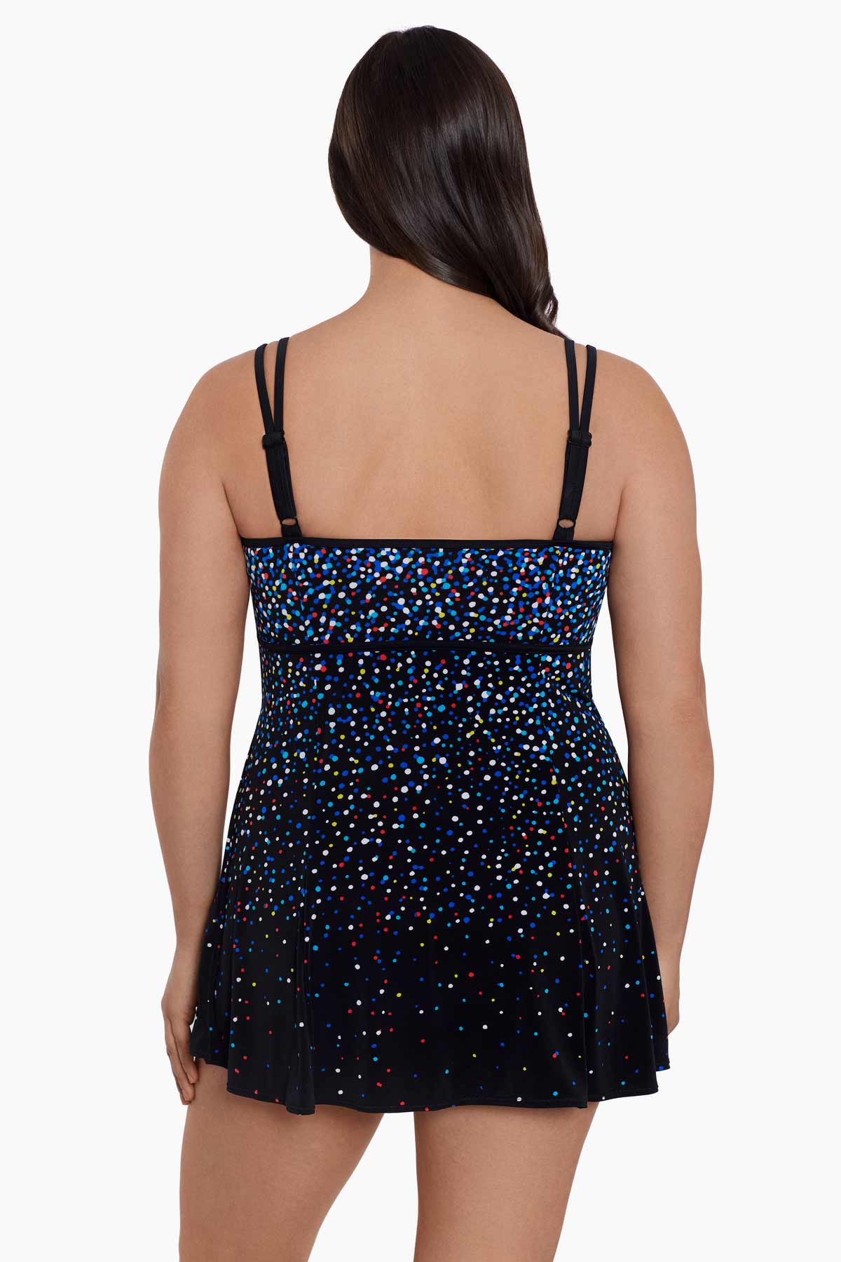 Woman faced away wearing a multicolored dotted pattern swim dress